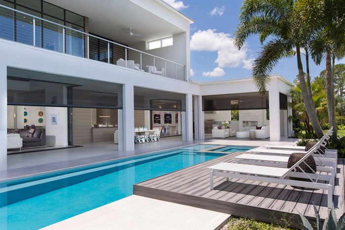 Winter Park architect and builder Phil Kean says outdoor living areas can “serve as another room in your home.” And he demonstrates it with such features as a pool area with a lanai and a summer kitchen protected by a retractable screen.